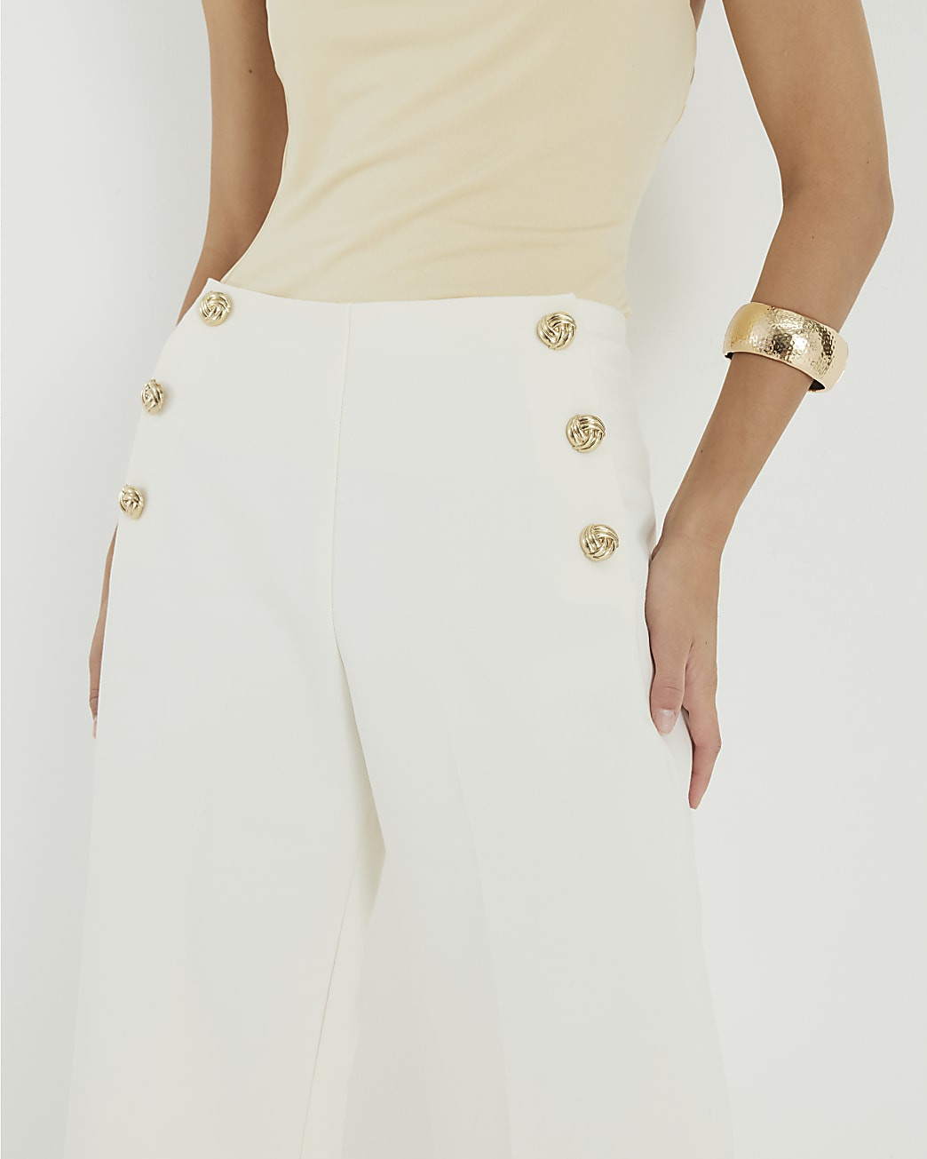 Cream Button Front Wide Leg Trousers | River Island UK & IE