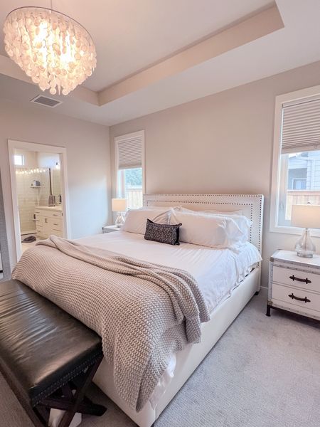 Master bedroom refresh! These nightstands, upholstered bed frame, and end of the bed bench create the perfect master bedroom retreat! Add this Capiz chandelier to finish the look. #masterbedroom #bedroom #upholsteredbedframe

#LTKstyletip #LTKhome #LTKfamily