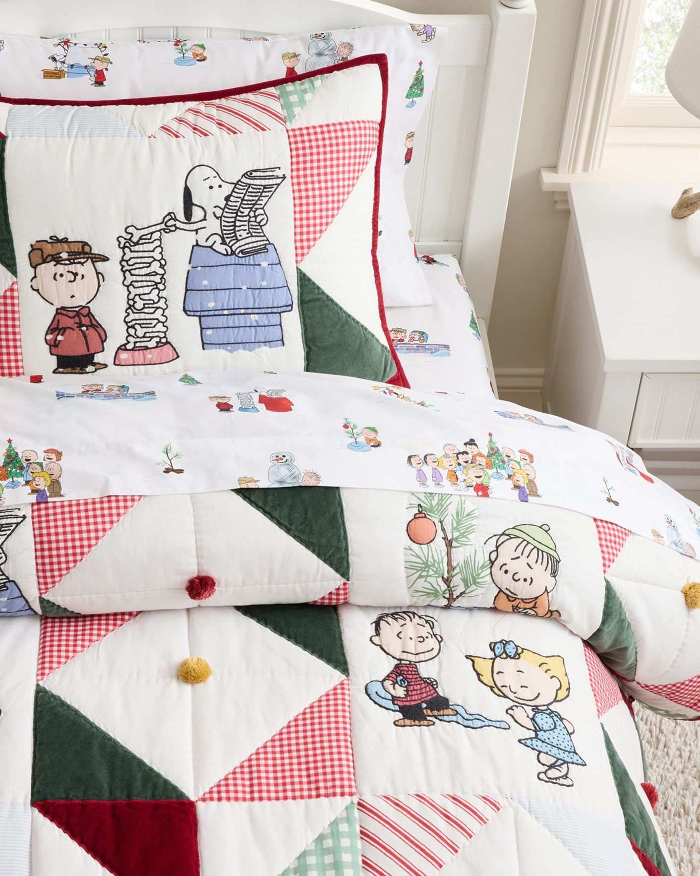 Cutest Christmas Peanuts Quilt. Picture close ups are from our freshly washed quilt. The embroidered images are straight from the classic cartoon. It washed beautifully. 

Capture the spirit of friendship and the holidays with this Peanuts quilt. Featuring Charlie Brown and the rest of the Peanuts gang, this patchwork blanket is crafted from durable cotton with velvet appliqués. With a solid red hue on the reverse, it's the ultimate festive layer. 

I also purchased the Christmas Peanuts bed sheets. See them and other Christmas Peanuts theme items in my LTK shop.

#LTKFamily #LTKSeasonal #LTKHome