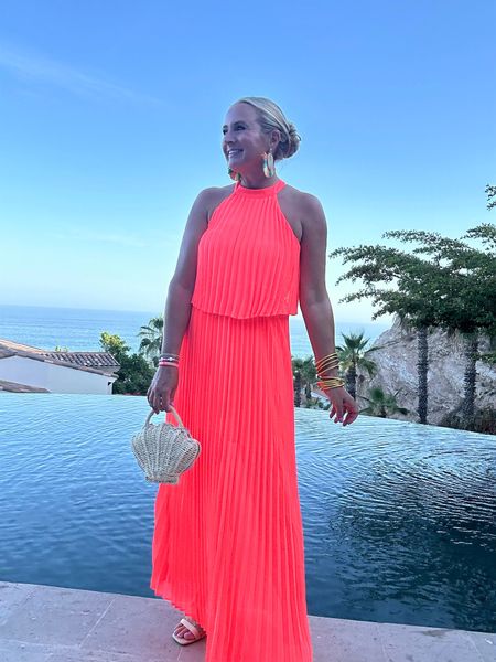 Summer dress perfection. This neon pleated beauty is so good. Wearing size small  

#LTKStyleTip #LTKFindsUnder100 #LTKOver40