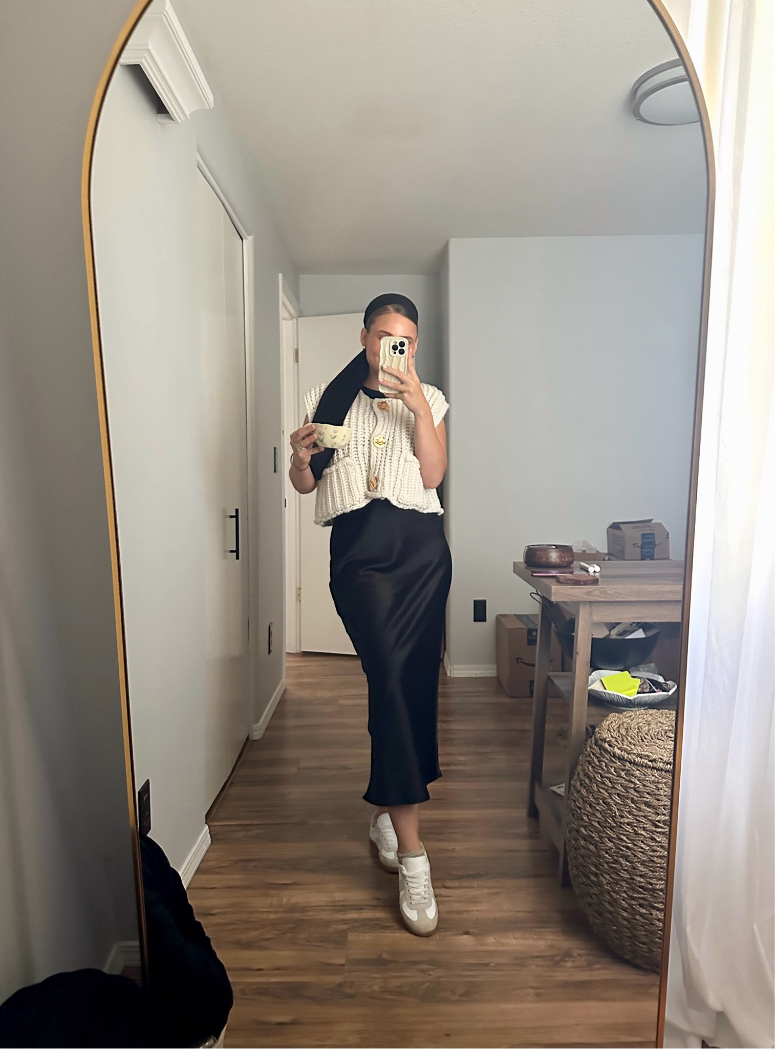 Deceivingly comfortable skirt outfit that I’m wearing for our little family road trip! Black midi satin skirt + trainers + knit sweater vest

#LTKStyleTip #LTKTravel #LTKFindsUnder50