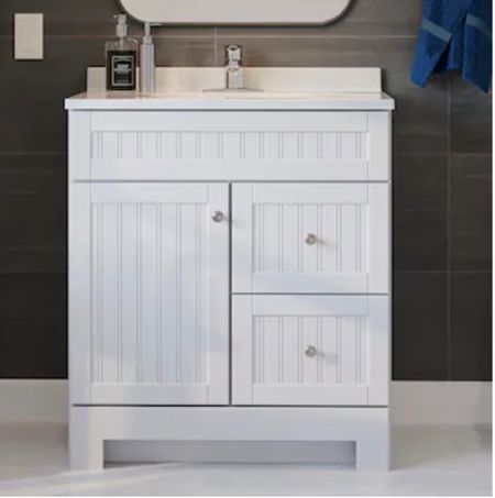 Bathroom Vanity. We added gold hardware. Linked the exact mirror and light fixtures as we used #bathroommakeover

#LTKhome