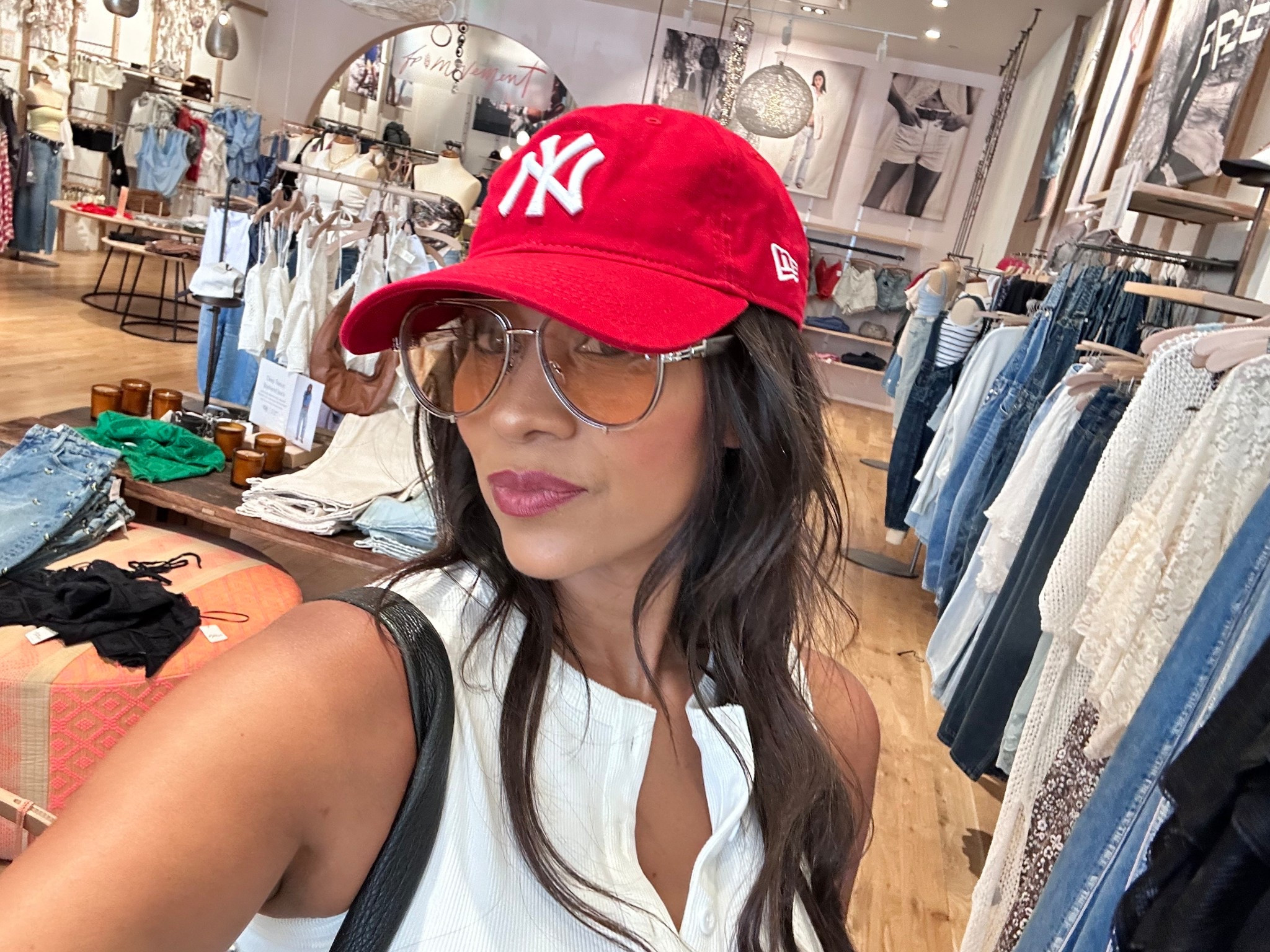 Trying on these Free People aviator sunnies should I grab them?? 🕶️🧢 Loving the vibe with my Yankees hat. 
To be real some of my fav sunglasses are from Free People mostly because they are all under $30 bucks 😅. 

Linking just in case you’re into them too! #FreePeopleStyle #LTKfinds #Yankees #Baseball #Aritzia #Hat #ShoppingWithMe #AviatorSunnies