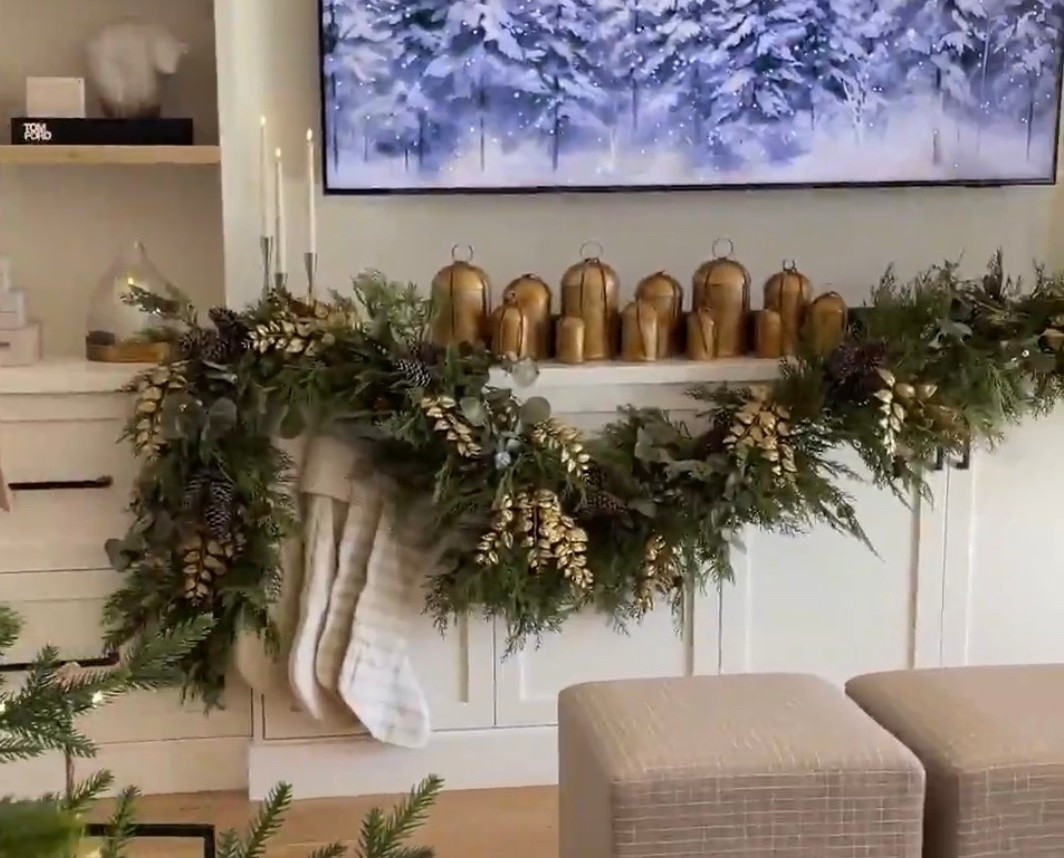 Linked my garland that is not only gorgeous but very full on its own! I used two in this photo. I also linked our gold bells and other options that are similar.

brass hanging bells, antique gold bells, small Christmas bells, jingle bells décor, rustic holiday bells, vintage style bells, hammered brass bells, Christmas mantel bells, oversized brass bell décor, full Christmas garland, lush holiday garland, realistic greenery garland, cedar garland décor, organic modern garland, eucalyptus and pine garland, full mantle garland styling, natural Christmas greenery, oversized garland look, luxe holiday greenery, winter foliage garland, elegant holiday mantel greenery, statement Christmas garland, neutral holiday garland, timeless Christmas greenery

#LTKStyleTip #LTKHoliday #LTKCyberWeek