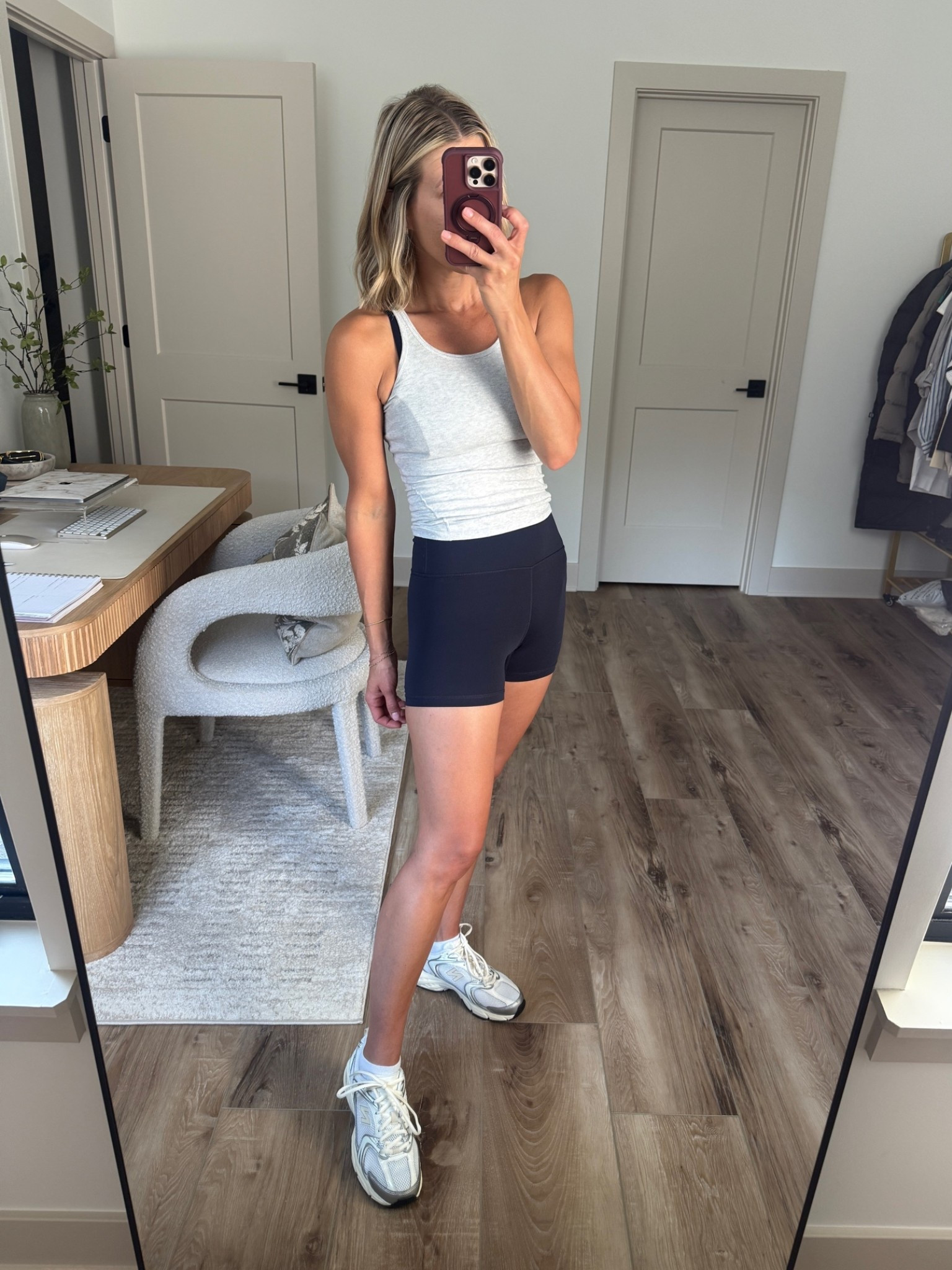 Wearing XS bike shorts, small sports bra, 2 tank, sneakers tts