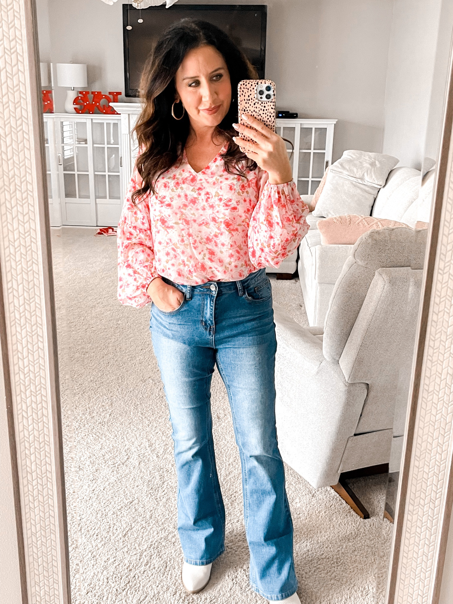 Floral blouse
Boot cut jeans 


#LTKFind #LTKunder50