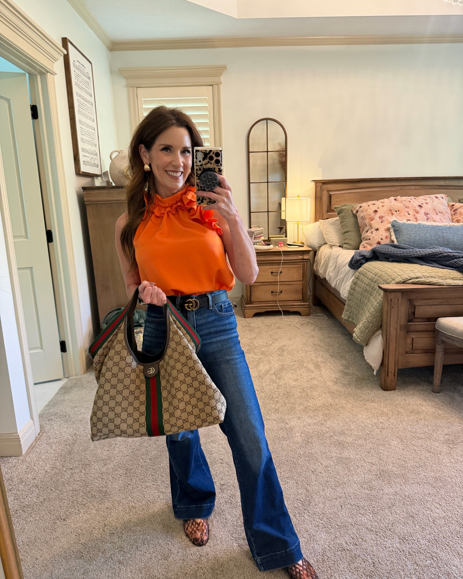 Fun pop of color with these trousers and catch all  Gucci bag.