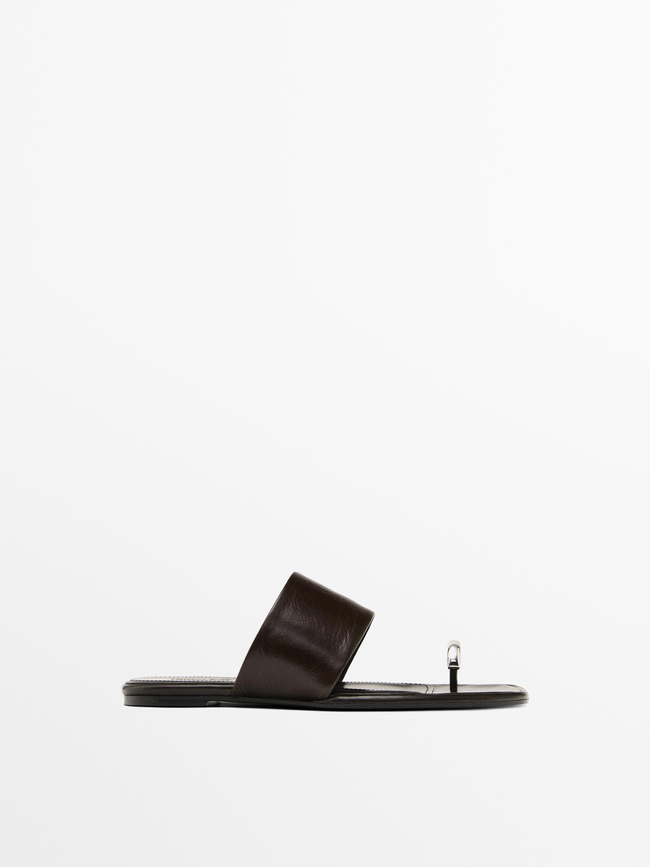Made of cowhide leather. Leather lining and insole . Wrinkled faux leather. Metallic ring detail ... | Massimo Dutti UK