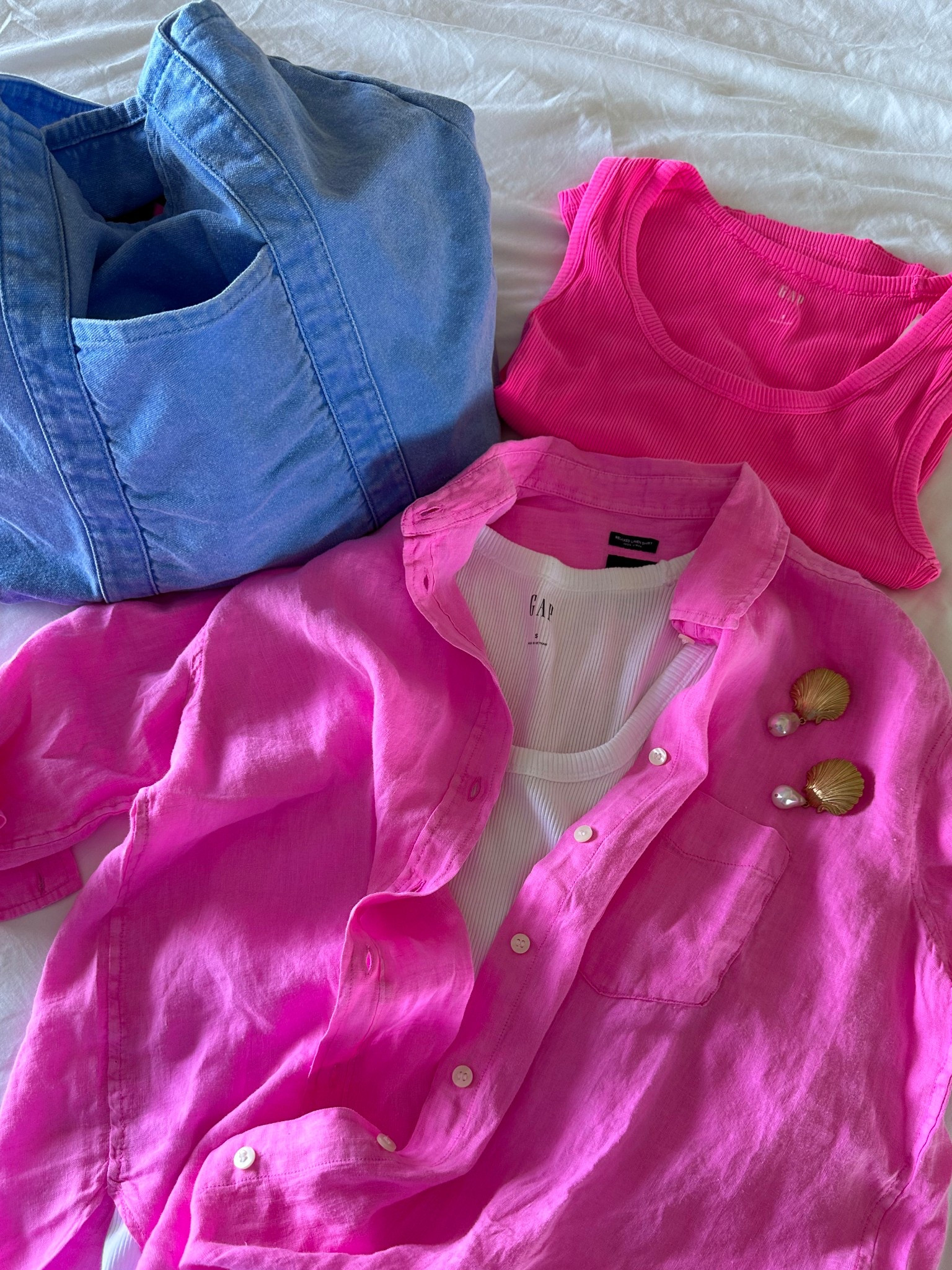 Colorful summer /vacation staples 

Tote
Tanks - run big! I bought small but xs would have been better 
linen shirt - got size small 

40% off at GAP for F&F sale 

#LTKSaleAlert #LTKFindsUnder50 #LTKTravel