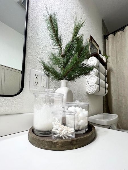 Dressing up a bathroom vanity with apothecary jars and some nature during my DIY bathroom makeover! 

#LTKhome #LTKfamily #LTKunder100