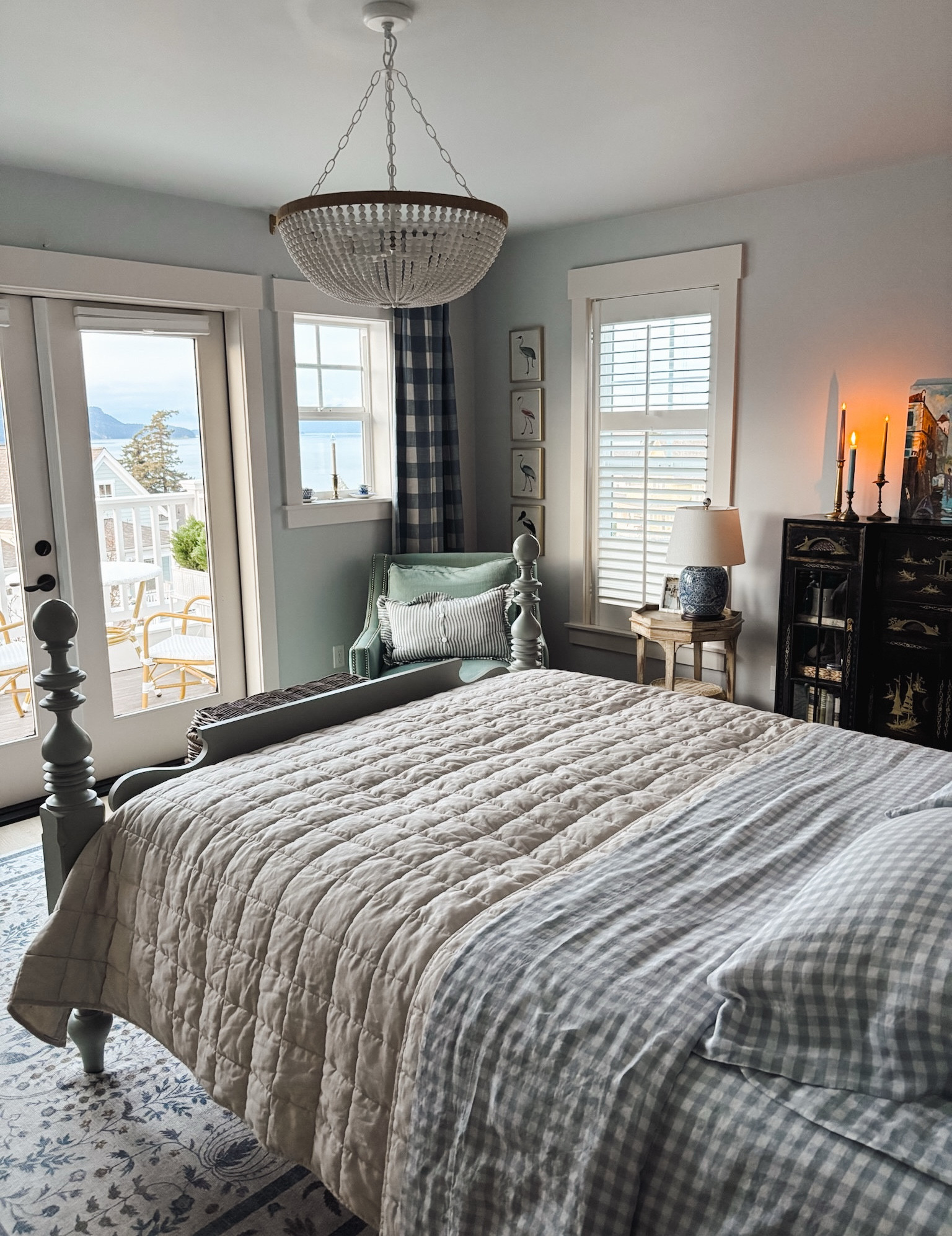 Blue and white cottage bedroom - linen gingham sheets, quilt, beaded chandelier, buffalo check curtains in chambray color, chinoiserie lamp, ticking pillow, bird art and more 

#LTKSaleAlert #LTKHome #LTKSeasonal