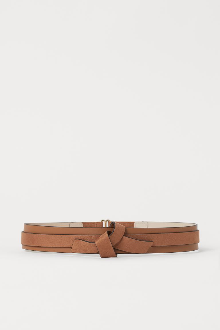 Wide waist belt in faux leather. Elasticized section at back with metal fastener. Double-layered ... | H&M (US)