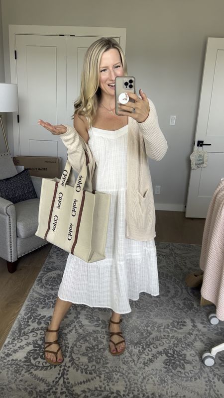 This is the perfect white dress or summer dress! Warm it up with a chunky cardigan, sandals and cute Chloe tote bag! Linking a similar style white dress from Amazon!

#LTKwedding #LTKSeasonal #LTKstyletip