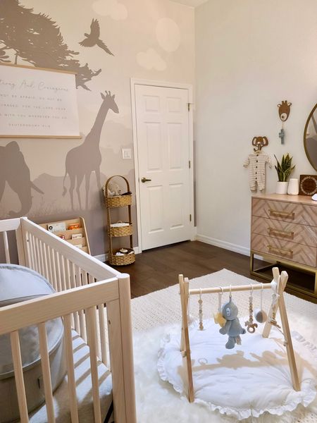 Neutral Nursery🐘

Baby nursery. Neutral nursery. Crib. Safari wallpaper. Customizable canvas. Baby gym. Faux fur rug. Area rug. Olive tree. Baby book shelf. Nursery details. 

#LTKbaby #LTKhome #LTKbump