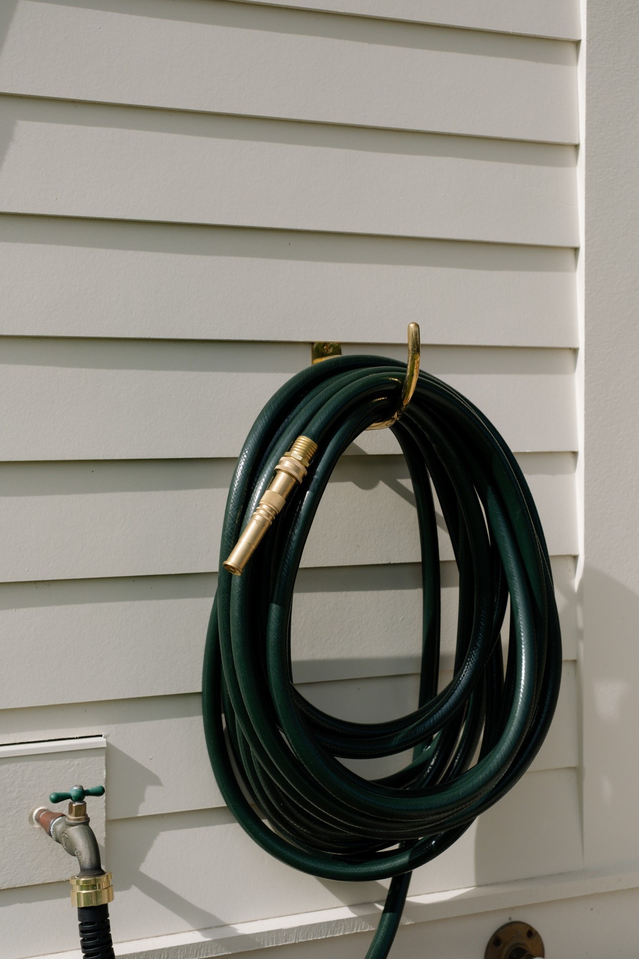 Hose, hose hanger, and hose sprayer

#LTKHome