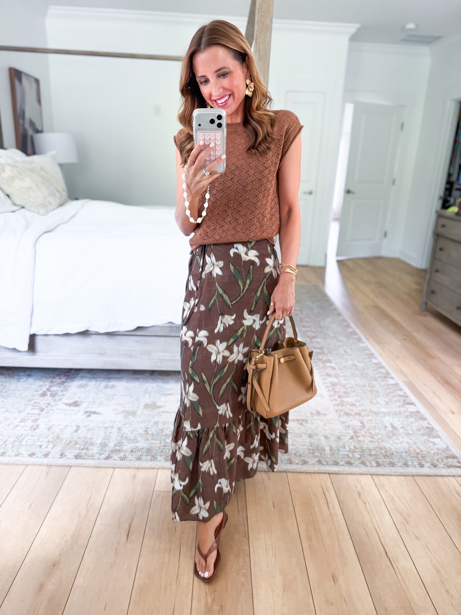 New Target arrivals for summer and early fall! Teacher outfit. Elevated casual outfit. Summer outfit. Fall outfit. Business casual outfit. Sweater top in XS. Floral skirt in XS. Jelly sandals. tory Burch Romy bucket bag. **Top is an open stitch so I have a tank top underneath.

#LTKootd #LTKPetite

#LTKWorkwear