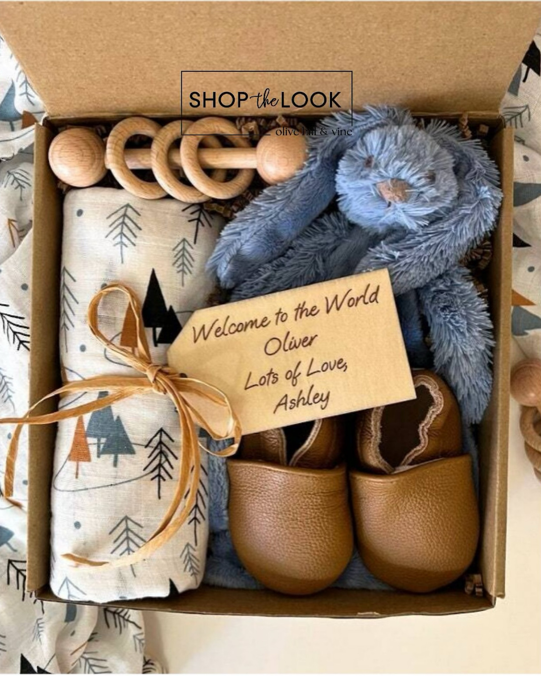 Looking for the perfect baby shower gift? This curated baby boy gift box has everything you need! It features a soft, 100% cotton swaddle with a charming tree print, a plush rabbit security blanket, genuine leather slip-on booties, an all-natural beechwood rattle, and even a personalized wooden gift tag. 

#LTKBump #LTKHome #LTKBaby
