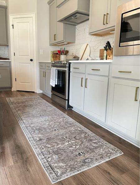Runner rug on sale for under $60! Turkish inspired runner rug blue, gray, and taupe. Hides messes easily. Great for high traffic areas like kitchen and entry way 

#LTKhome #LTKunder50 #LTKsalealert
