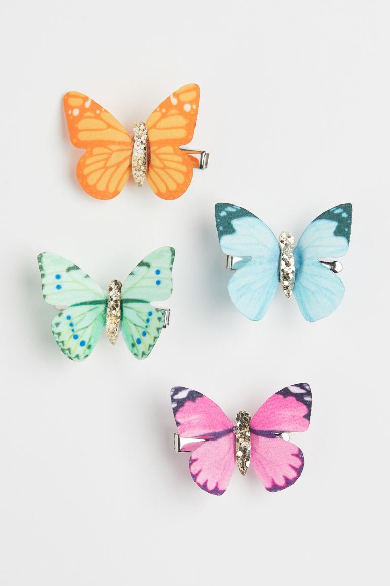 Hair clips in metal with fabric appliqués with glittery details. Length of clips approx. 1 1/2 i... | H&M (US)