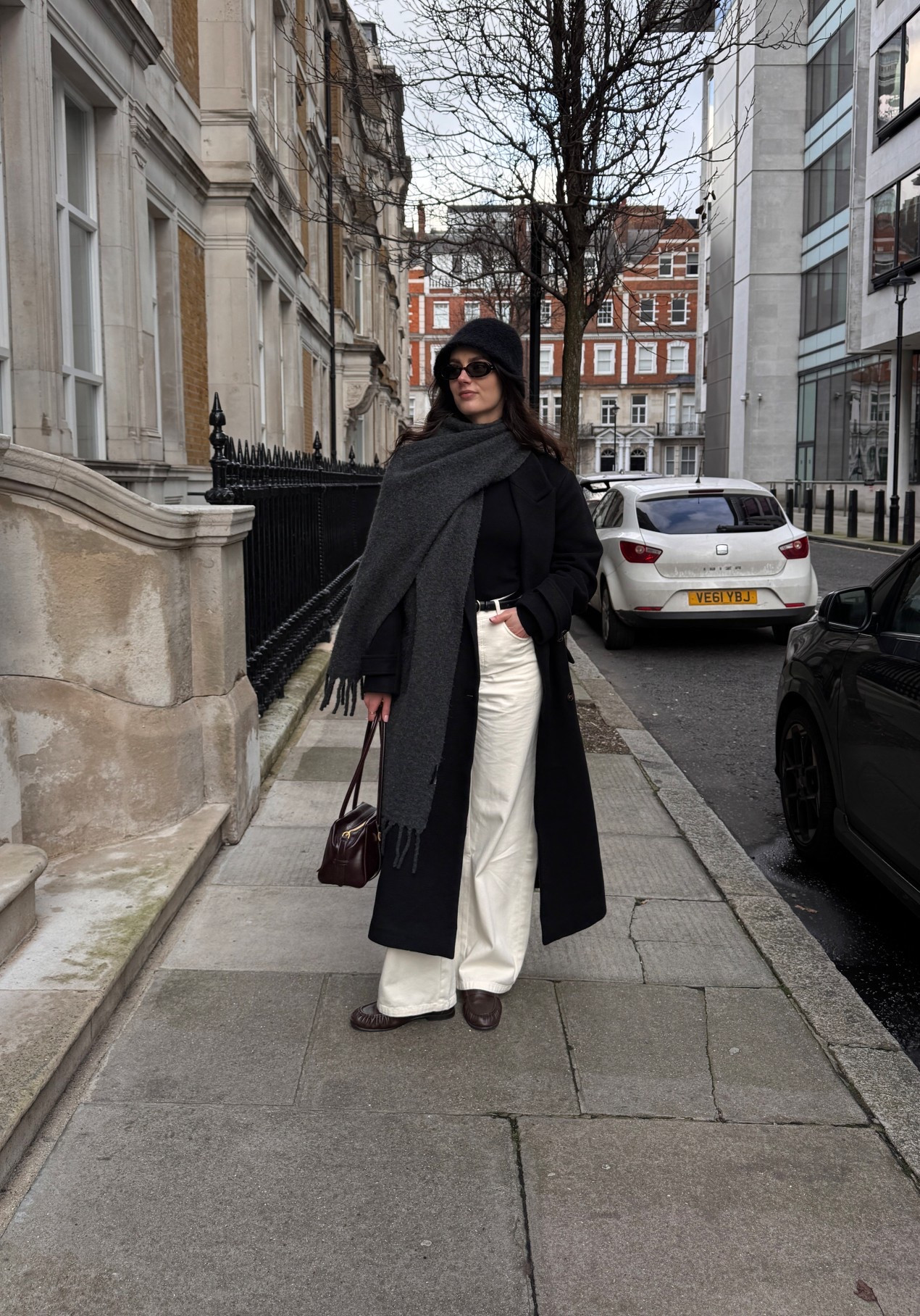 Long black coat with white jeans

#LTKspring #LTKwinter #LTKuk