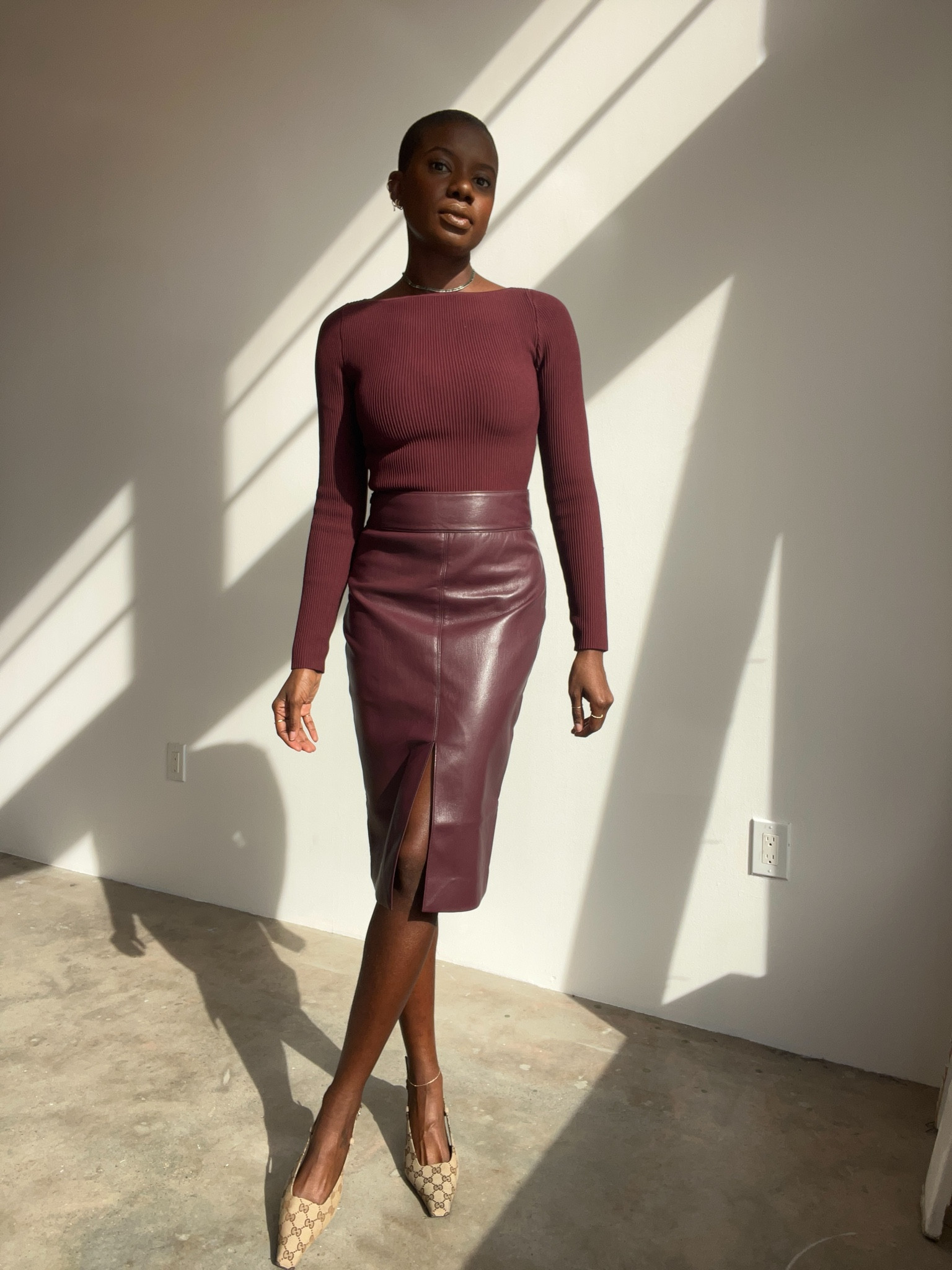 Great work wear option! Monochrome maroon outfit. Long sleeve ribbed top and faux leather midi skirt with tan Gucci sling back heels  

#LTKworkwear #LTKHoliday #LTKSeasonal