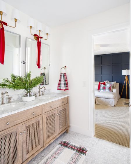 Our guest bathroom decorated for Christmas last year! Includes our wood and cane vanity with marble countertop, silver framed mirrors, red velvet ribbon, faux holiday greenery, and Stewart plaid towels and bath mat!

#ltkholiday #ltkhome #ltkseasonal #ltksalealert #ltkunder50 #ltkunder100 #ltkstyletip Christmas bathroom decor, cozy Christmas decorating, Christmas décor, Christmas towels, Christmas bathroom towels, amazon Christmas, amazon finds, amazon home, pottery barn Christmas, pottery barn bathroom

#LTKHoliday #LTKsalealert #LTKSeasonal