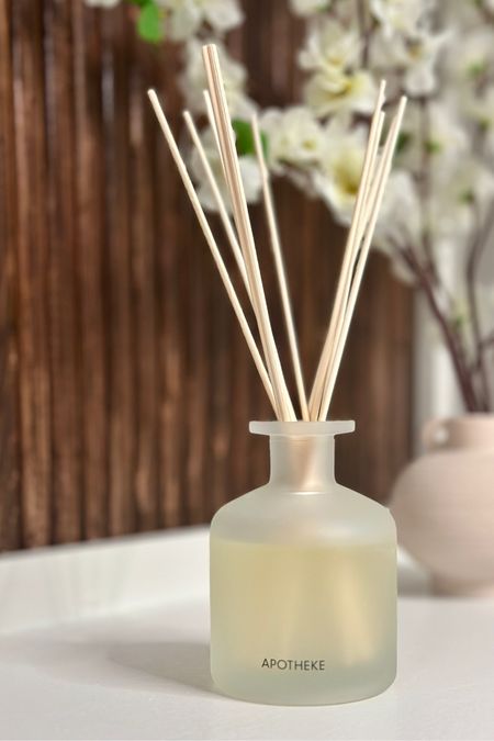 Loving this reed diffuser in the master walk in closet - white vetiver from apotheke is earthy and sultry. The scent has notes of cashmere, eucalyptus and lilac mixed with sandalwood and amber. 

I am impressed with how room filling the fragrance is as I have it in a large room. This would be a great scent for a powder room as well. 

Home fragrance // Reed diffuser // luxe for less home // home decor favorites 

#LTKSaleAlert #LTKHome #LTKFindsUnder100