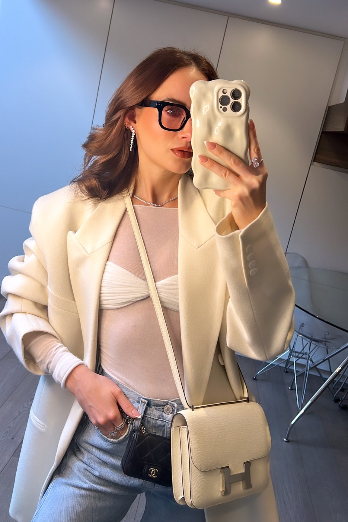 White sheer top, cream blazer 

#LTKU #LTKSeasonal #LTKeurope