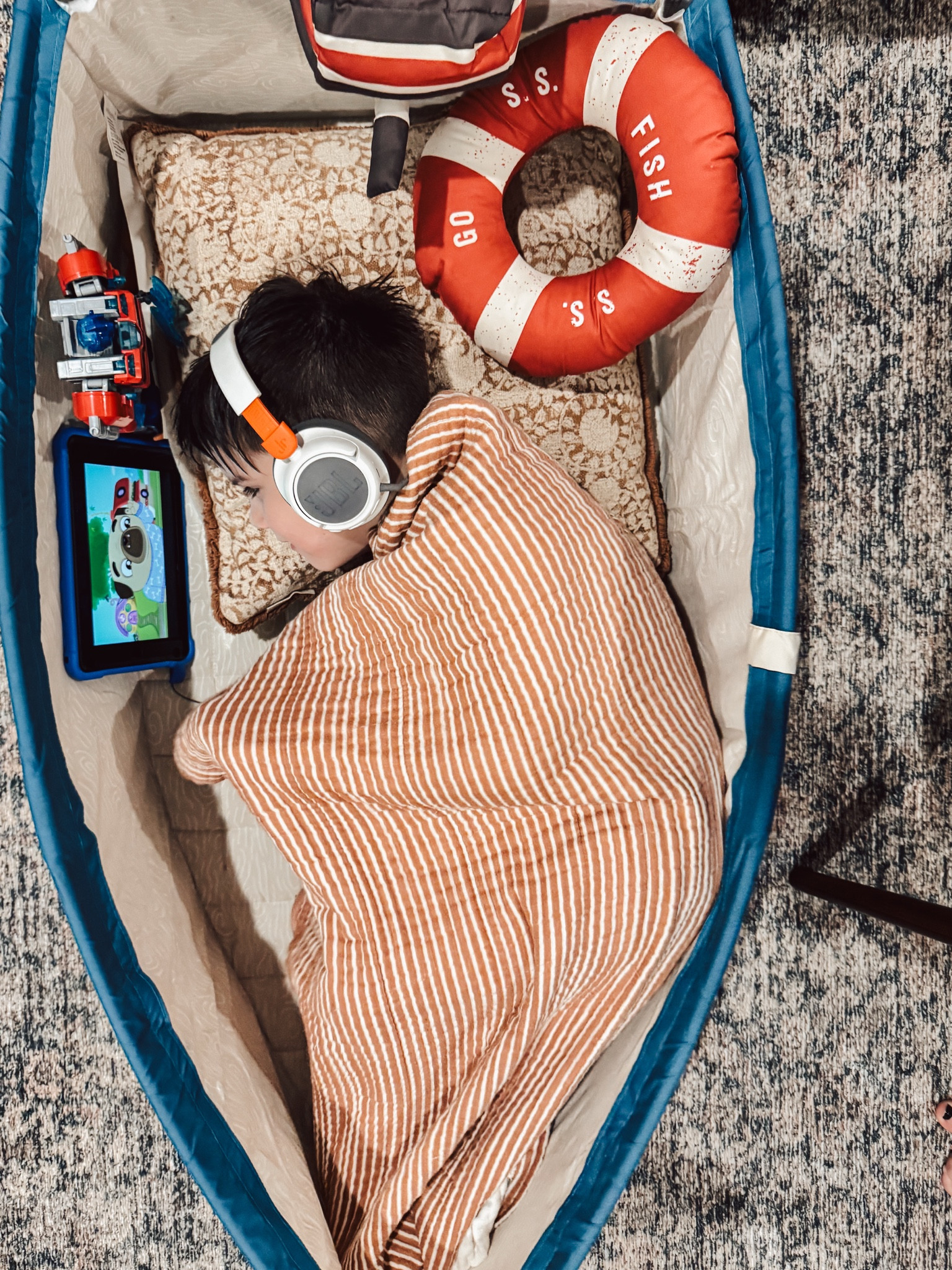 Why buy a toy basket when you can store your toys (or your 5 year old) in a boat? My little one loves this boat. I thought he’d be too big for it but as a near 60 pound 5 year old, he loves cuddling up in it.