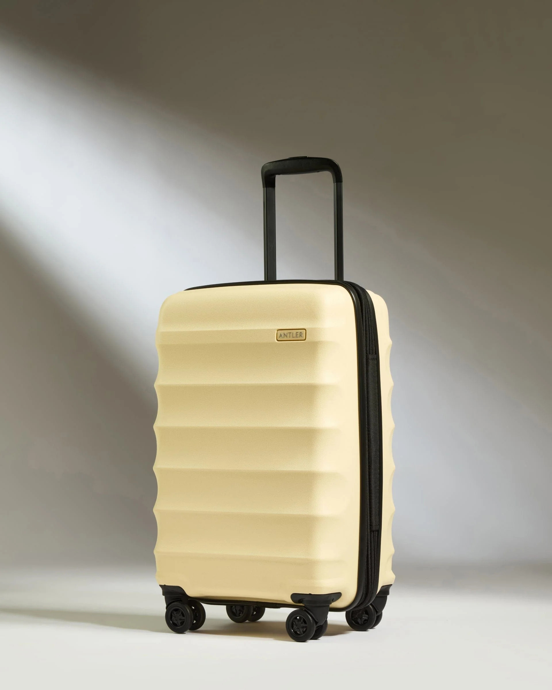 Cabin Suitcase with Expander in Yellow - Juno | Carry-on Luggage | Antler UK