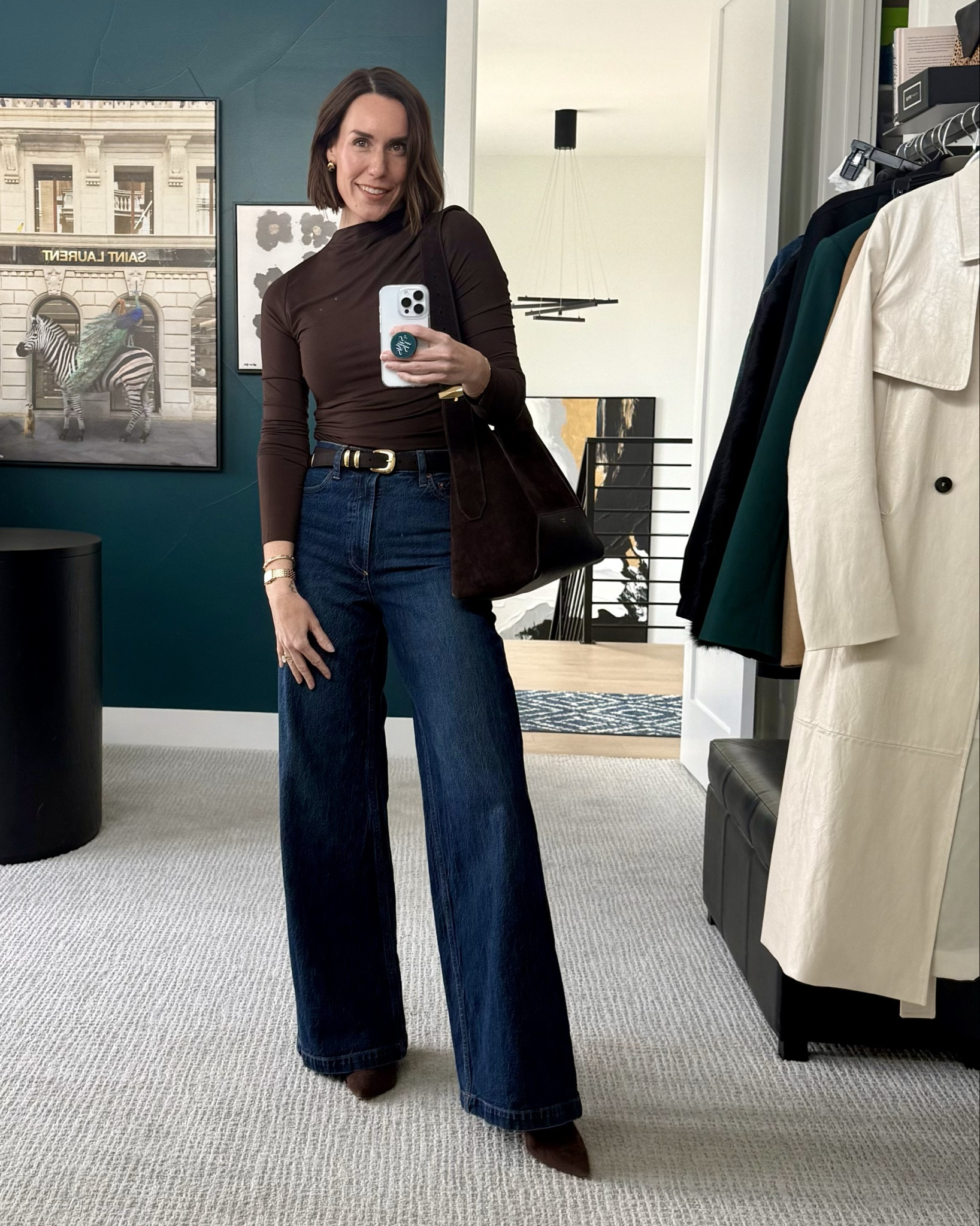 Crisp, clean, elevated look. Simple top & denim pairing. Went with the rich chocolate brown and dark blue denim combo. Styled and polished off with rich brown suede belt, bag and boots. Mixed metal silver/gold jewelry to compliment. 🤎💙

#LTKootd #LTKOver40