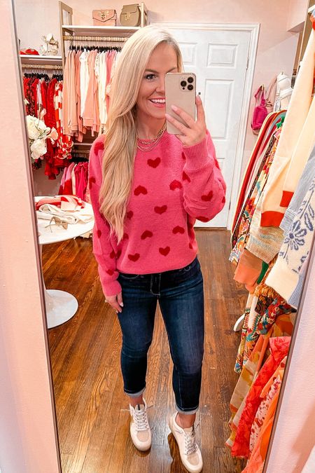 Heart sweater is perfect for Valentine’s Day! This top is so cozy and runs tts. Wearing size small. 