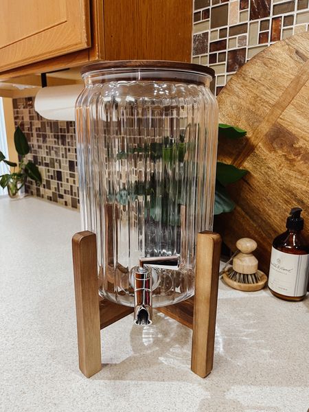 Used this for the first time yesterday when hosting family at our new home. Love the wooden stand and ribbed container!

2gal Ribbed Clear Plastic Beverage Dispenser with Stand & Wood Lid - Hearth & Hand with Magnolia

Target find, home decor, hosting, party, outdoor dining, drink dispenser, margarita dispenser, 

#LTKhome #LTKunder50 #LTKSeasonal