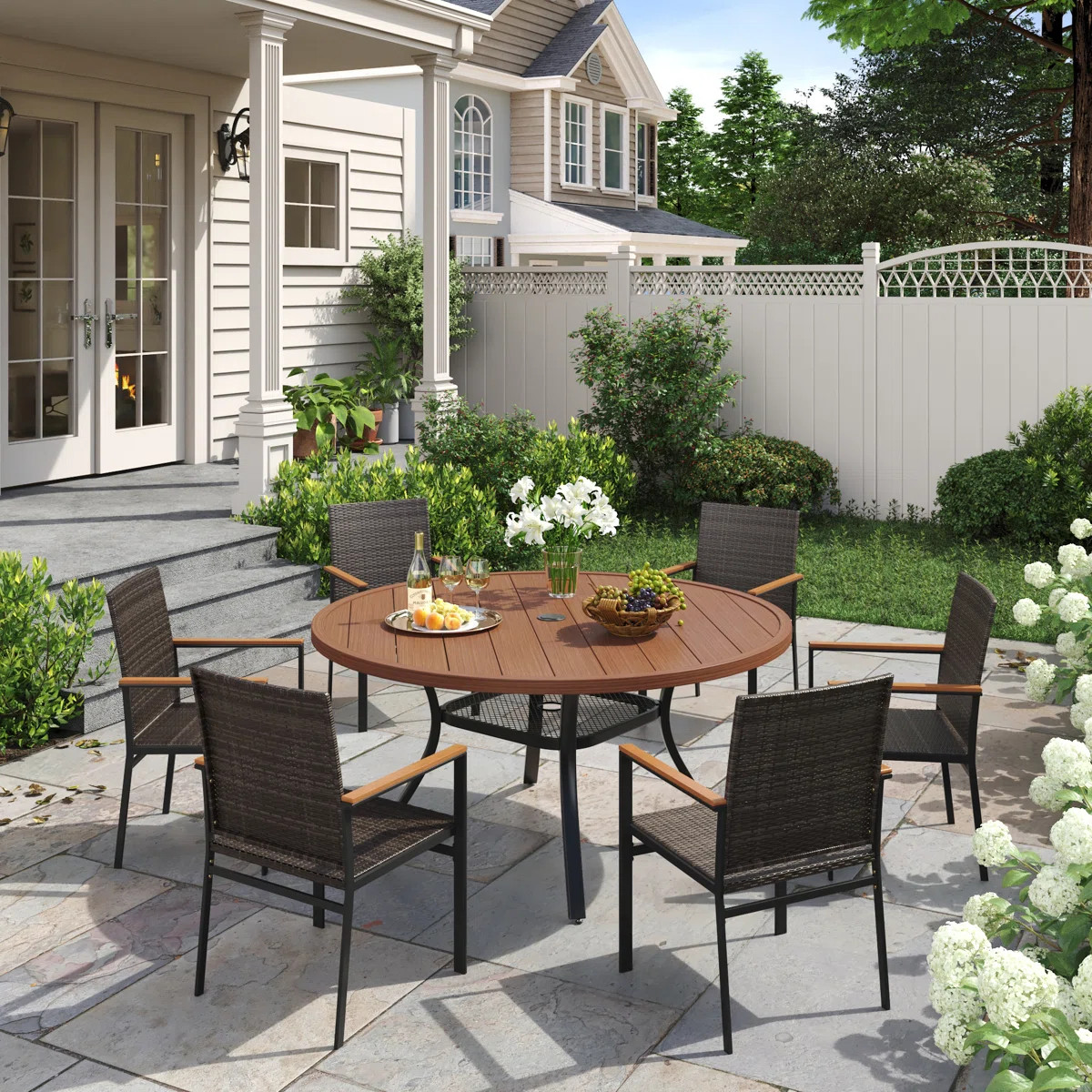 This 6-piece outdoor patio set, featuring a classic round table paired with six breathable rattan... | Wayfair North America