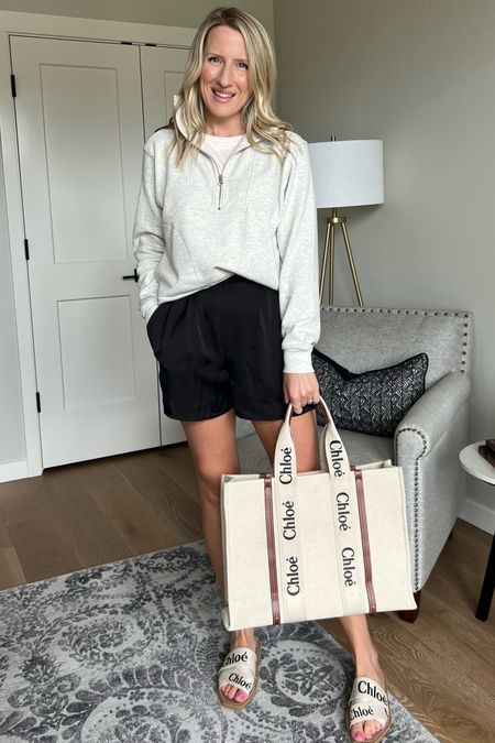 Keeping it beach casual! High waisted shorts, a half zip sweater, and Chloe woody tote and sandals! #springbreak #spring

#LTKfindsunder100 #LTKitbag #LTKstyletip