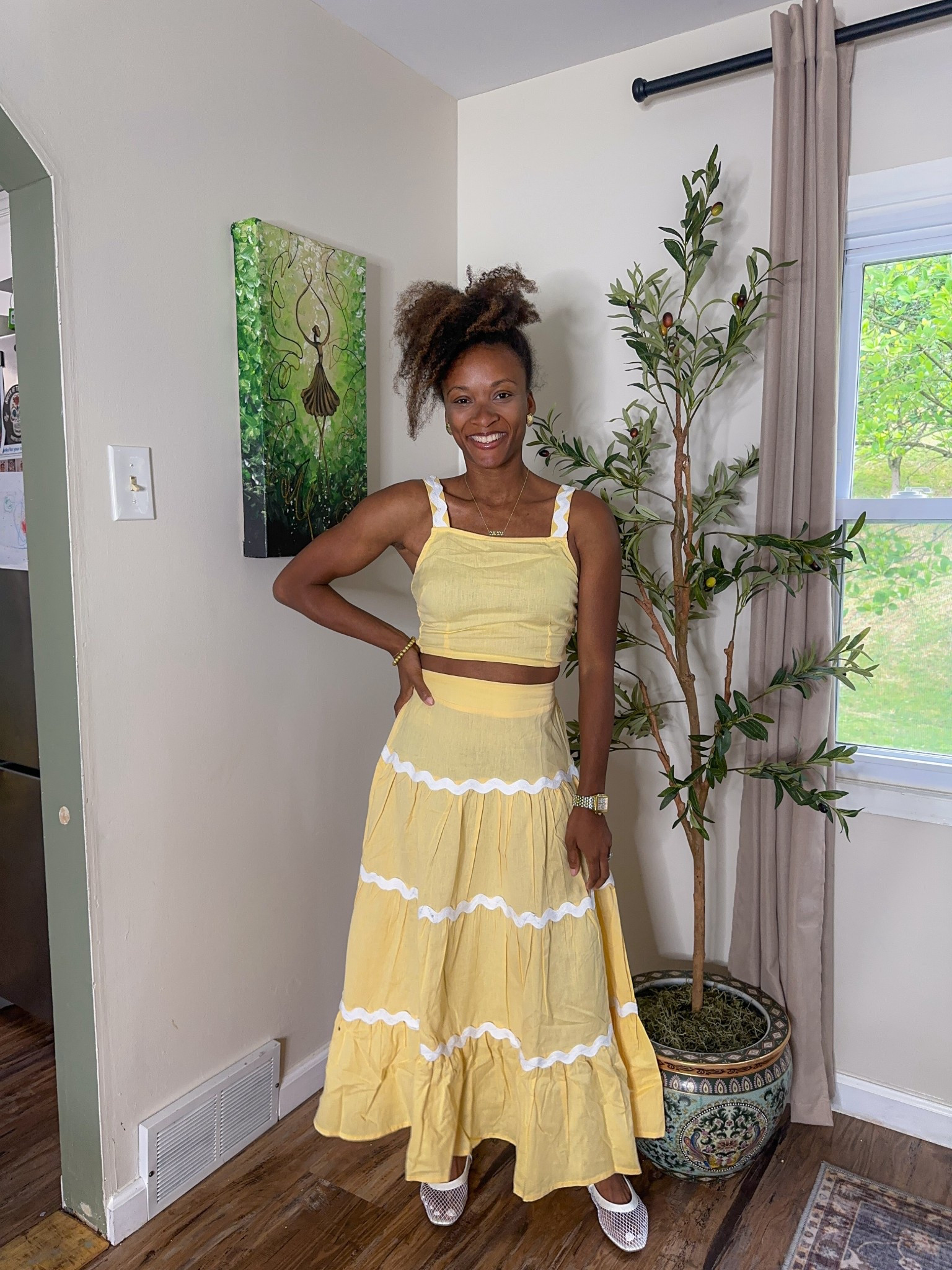 Beautiful 2 piece skirt set in the trending butter yellow color.  Wearing size smalll