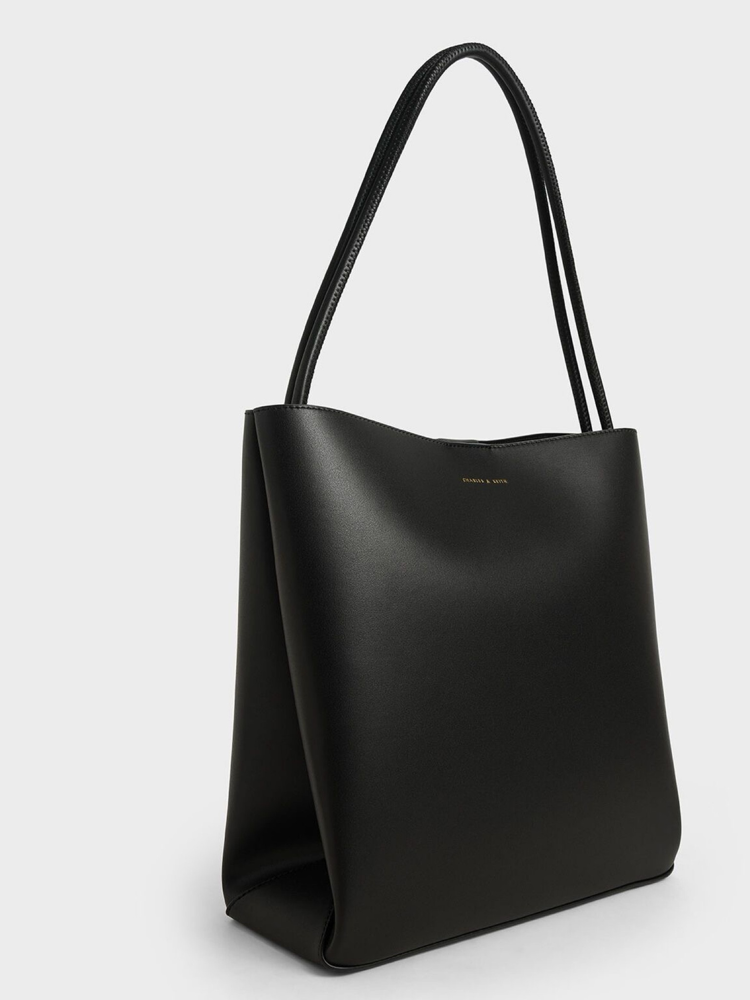 The row quiet luxury tote bag