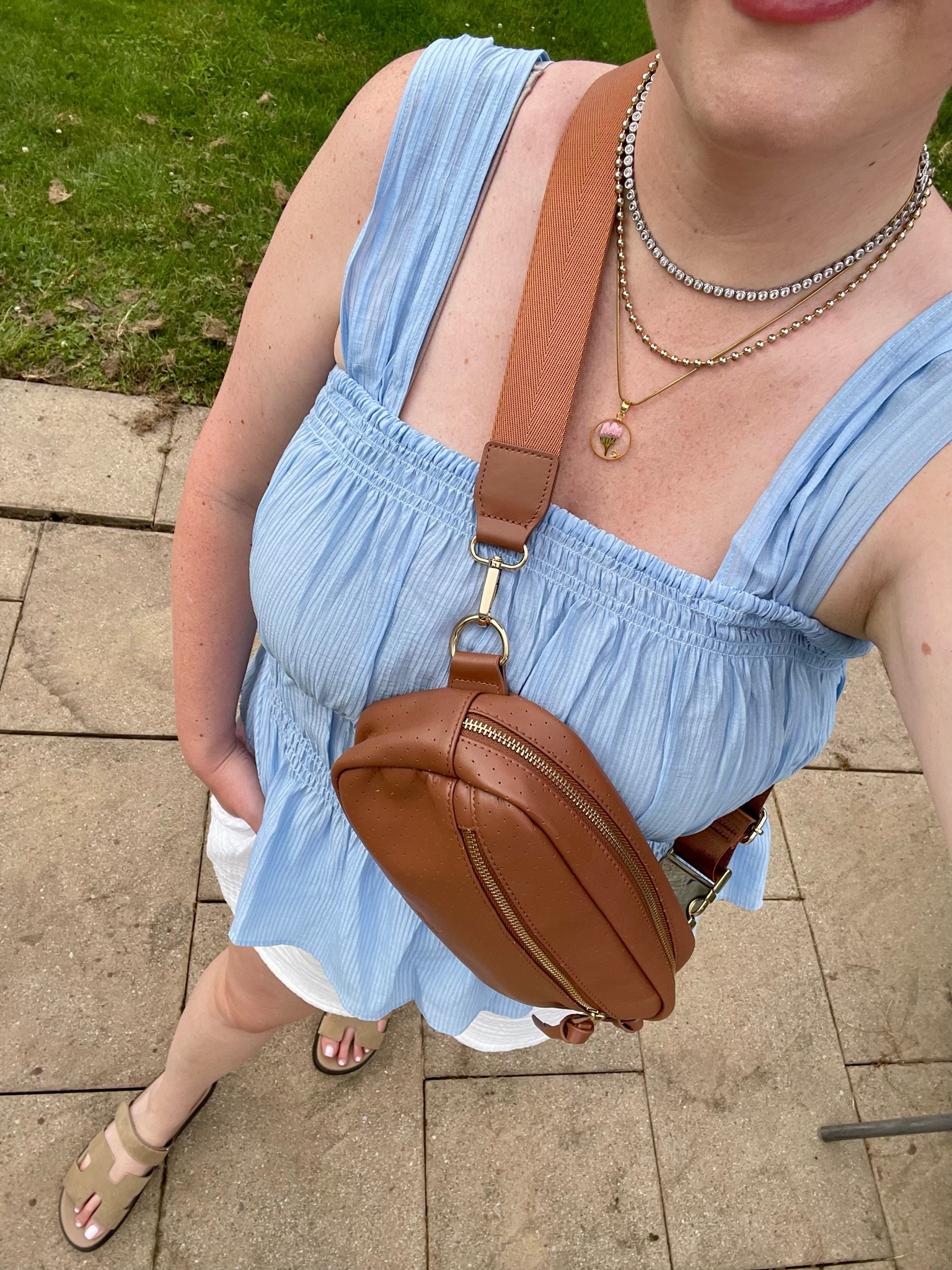 Easy summer outfit inspo. Blue tank , white shorts, brown sandals, brown belt bag  

#LTKSeasonal #LTKShoeCrush #LTKMidsize