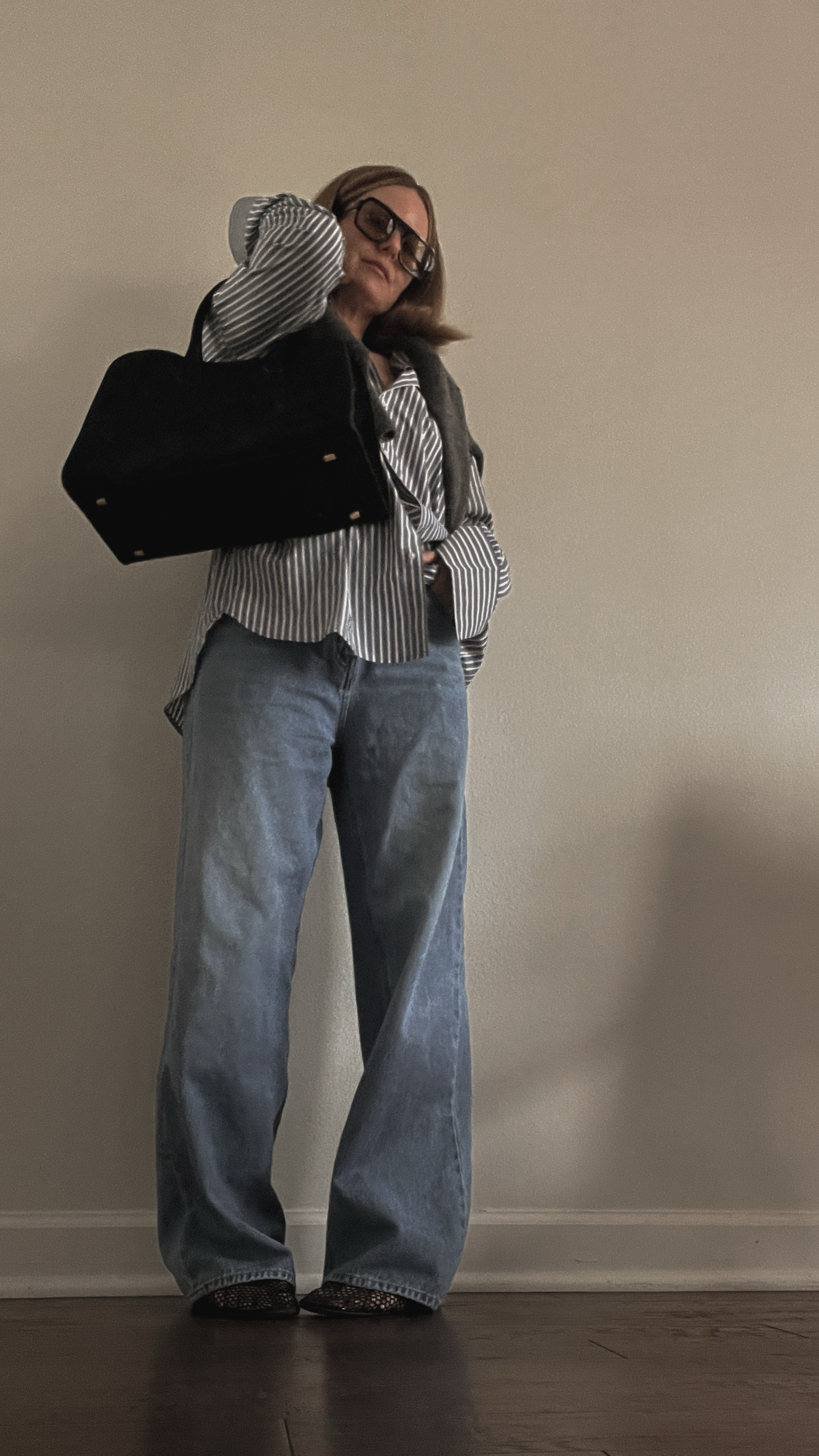 striped button-down | baggy jeans | mesh flats | bag

#LTKStyleTip #LTKOver40 #LTKWorkwear