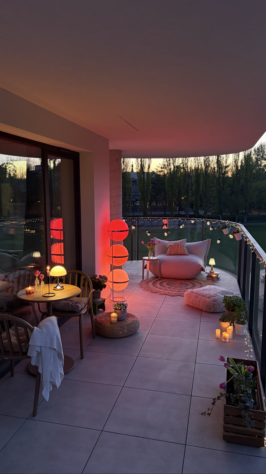 Love how my balcony turned out to be cozy and comfy. 🩷
#cozybalcony #howwelive #balcony #balconydecor #ambientlighting
