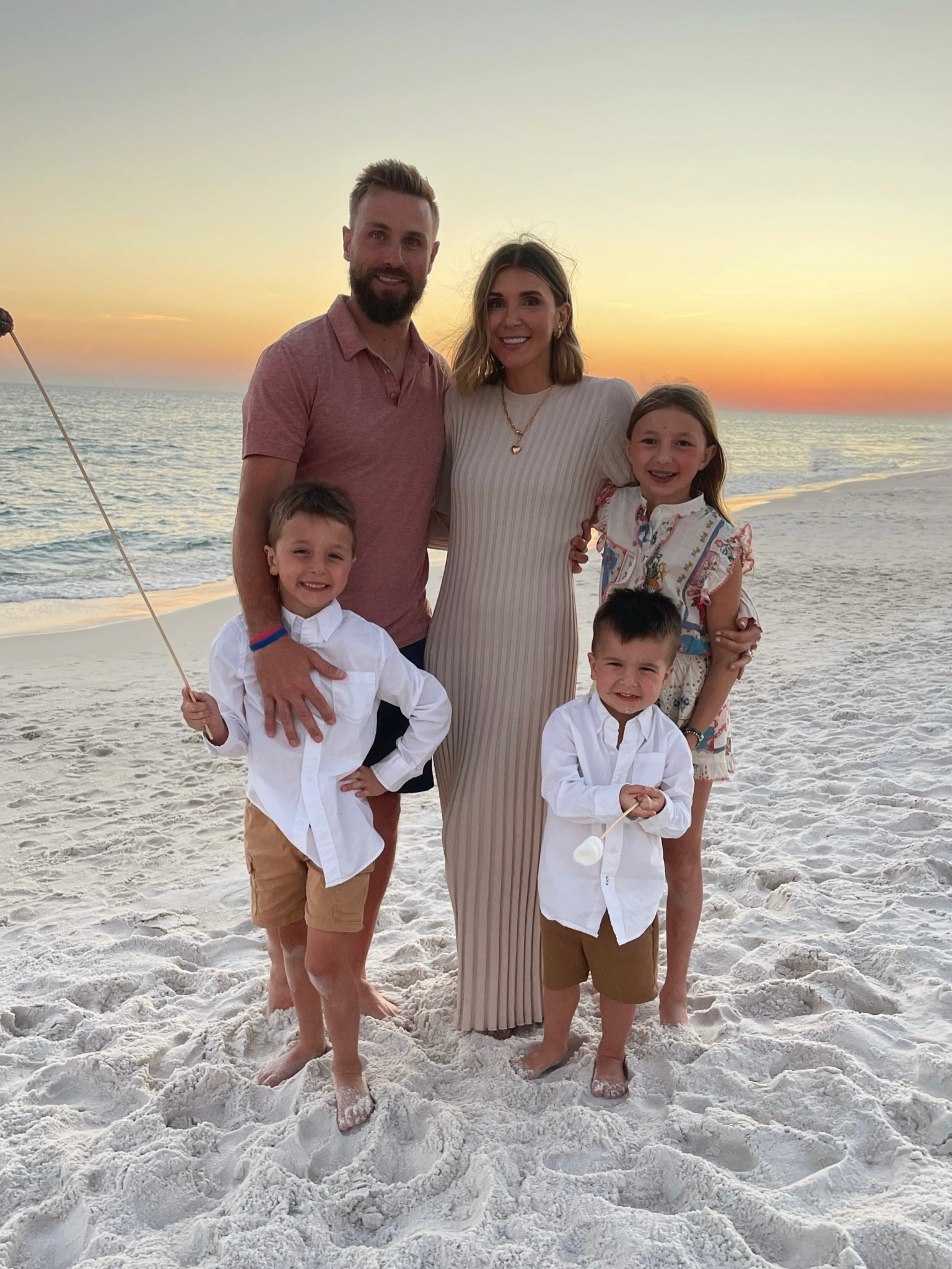 Family photos on the beach - linking all the kids and my outfit 