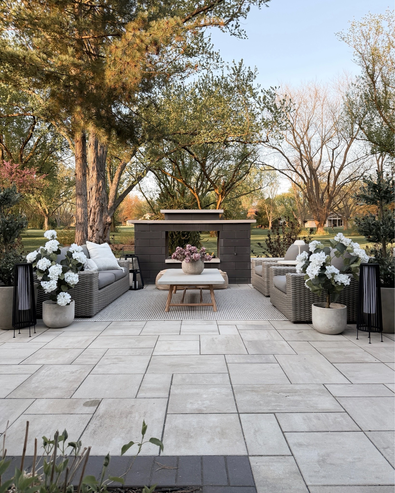 I'm loving these new solar rope lanterns and faux trees that we added to our backyard patio this summer. They provide the prettiest look at a reasonable price, and there's no maintenance!

#LTKSeasonal #LTKHome #LTKSaleAlert