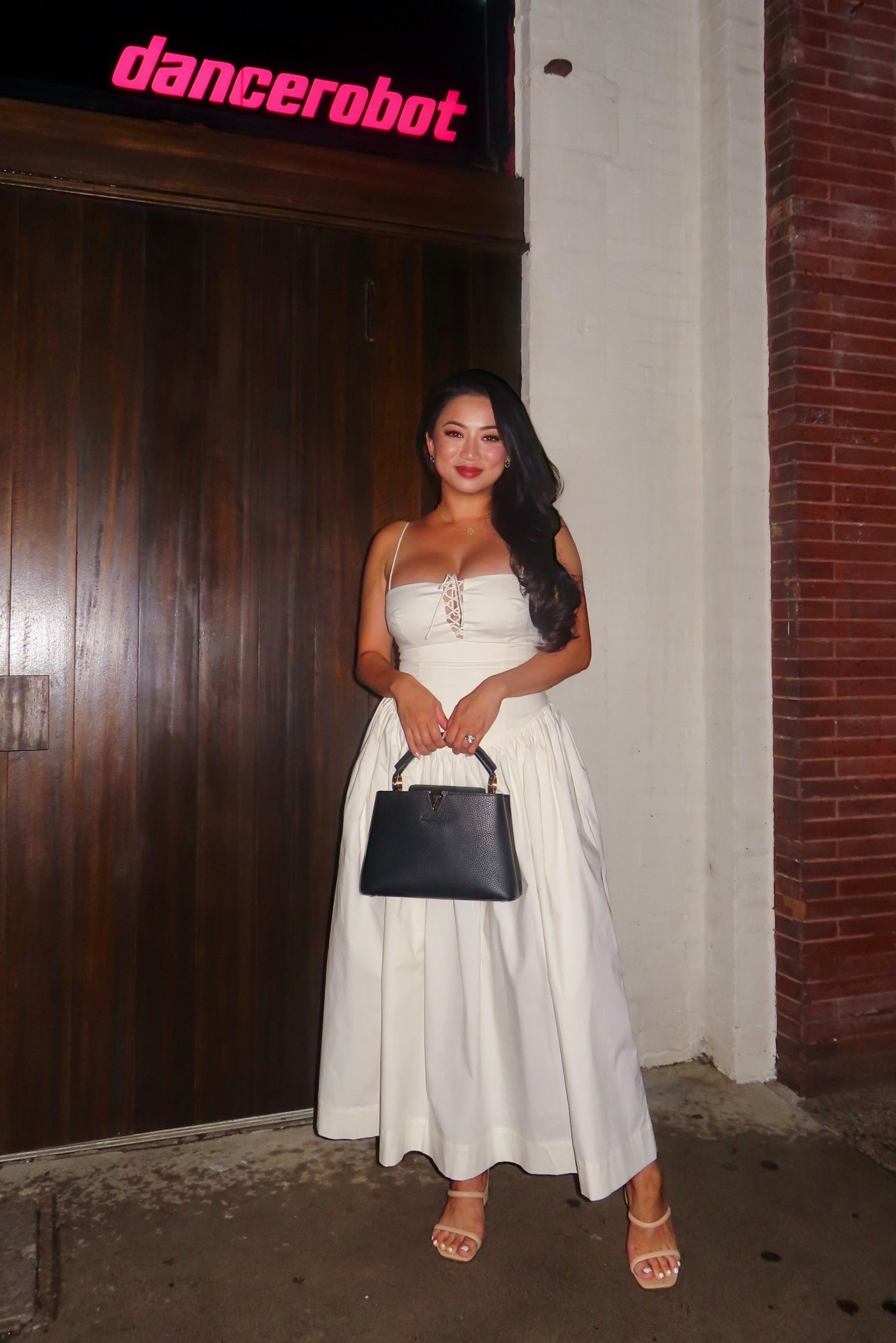 by Marianna Thierry Midi Dress by L'Academie // Ivory midi dress with fitted bodice, thin straps, front tie cutout, and a full flowy skirt with pockets.

#LTKParties #LTKOver40 #LTKStyleTip