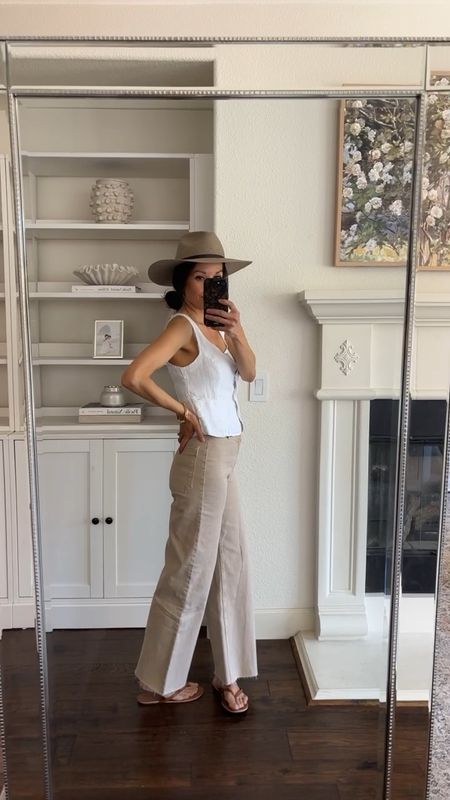 - Linen vest. Wearing a size 2. On sale. SO comfortable.
- Wide leg, cropped culottes. LOVE this “sand” color. I’m wearing my regular size 2. The reviews are mixed, but I absolutely love them and they fit so well. 
- Janessa Leone packable hat. I’m wearing a medium.
- leather flip flops. They run true to size. 

Neutral summer outfit 
Beige jeans
White linen vest 

#LTKTravel #LTKOver40 #LTKSaleAlert