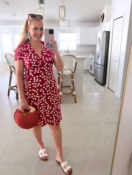 This faux wrap dress from amazon is perfect to throw over your bikini or swimsuit on spring break. Super soft, comfortable and stretchy. Wearing a medium. Fits true to size .

Also check out my slide sandals. Sooo comfy too!

#LTKswim #LTKtravel #LTKshoecrush