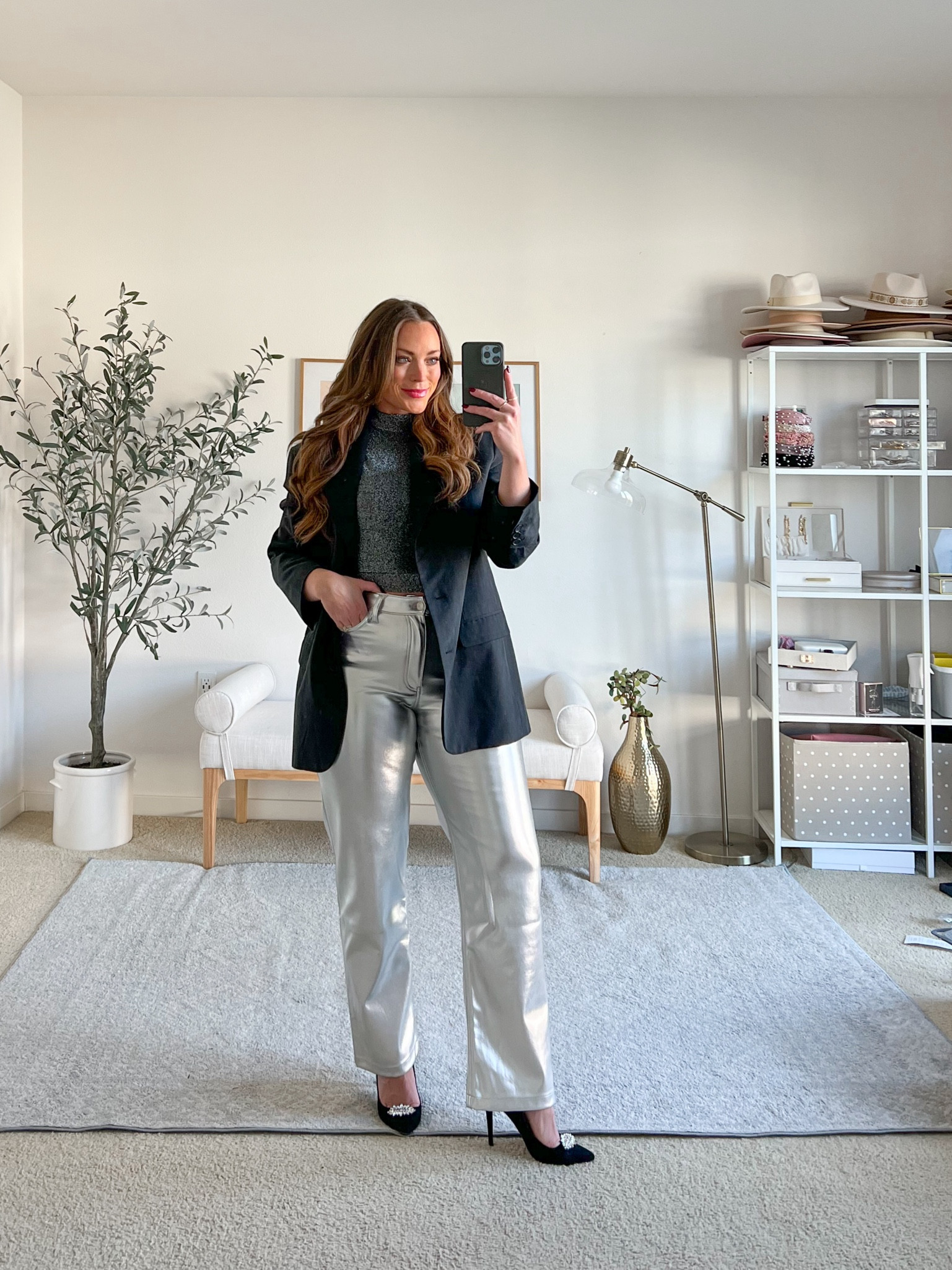 Holiday party outfit inspo. These metallic silver jeans are a statement! I like them styled with an oversized blazer, cardigan or long tunic sweater, I feel like the length tones it down a little!  This metallic top is priced under $60 and currently an additional 20% off. Im wearing a medium but could have done a small too!
Jeans are a size 29/8R- I size up in leather or anything bright like this!
Blazer US6


#LTKmidsize #LTKparties #LTKHoliday