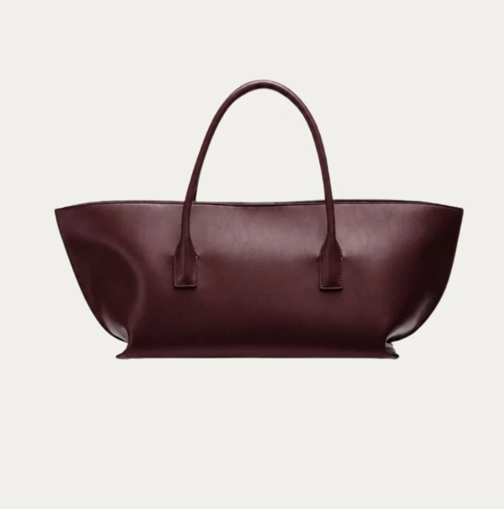 Greta Tote Burgundy
$298.00

Crafted in our newest vegan calf leather finish, the Greta balances everyday function with easy wearability. Designed with an elongated silhouette and softly structured shape, she is spacious for all your daily essentials

#LTKootd #LTKTravel #LTKWorkwear