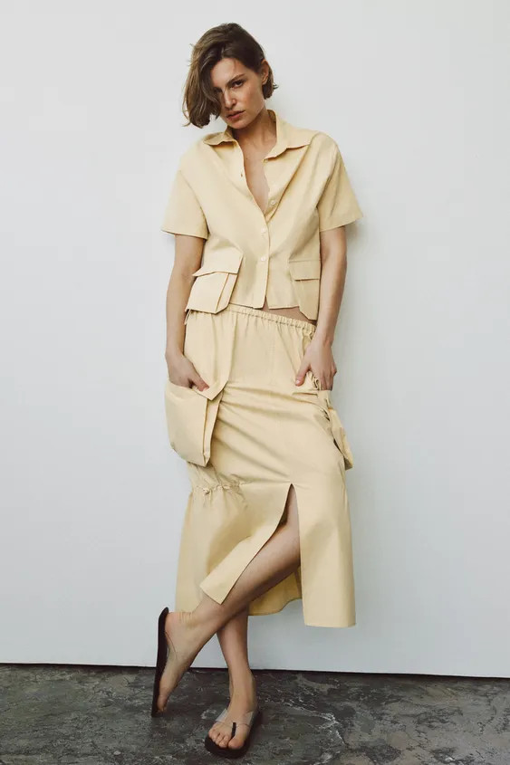 ZARA WOMAN COLLECTIONShirt made of cotton yarn. Featuring a lapel collar and short sleeves. Front... | Zara UK