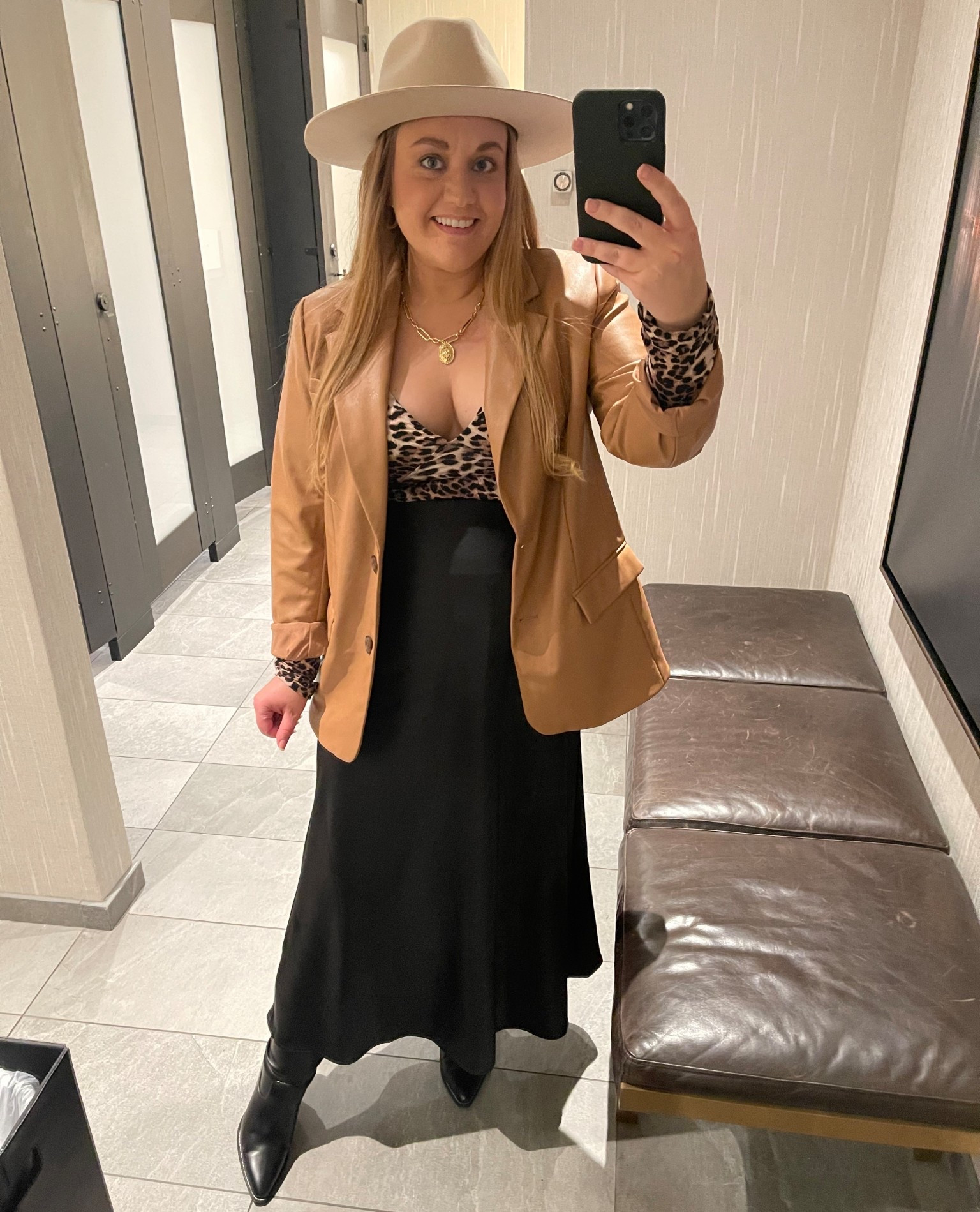 Mixing brown and black, Black and leopard, blavk and tan, Satin skirt, maxi skirt, black skirt, Amazon outfit, Amazon style, weekend style, Nashville outfit, country concert, western, rodeo, wide brim hat, tan hat, western hat, leopard top, black boots, western boots, pointed toe boots

#LTKBump #LTKootd #LTKTravel