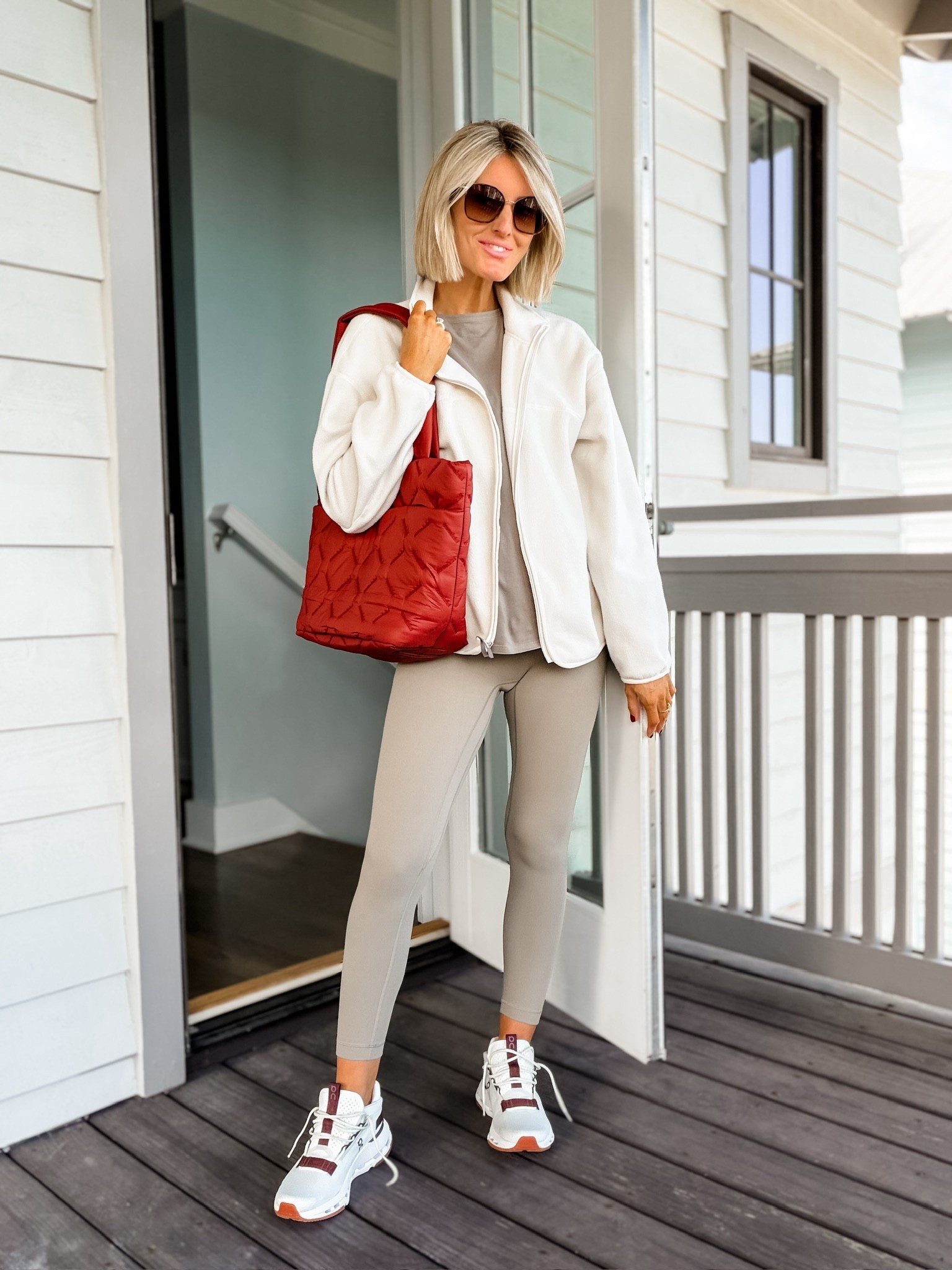 This red quilted tote bag is so cute & perfect for bringing to the gym! I’m wearing this white fleece jacket over this warm grey tee & leggings! An easy activewear outfit for a morning workout this fall! Wearing S in jacket, 6 in tee, and 6 in the leggings! 

Loverly Grey, athleisure, activewear, lululemon, workout outfit, fall outfit, travel outfit, fleece jacket, leggings, tote bag 

#LTKStyleTip #LTKActive #LTKItBag